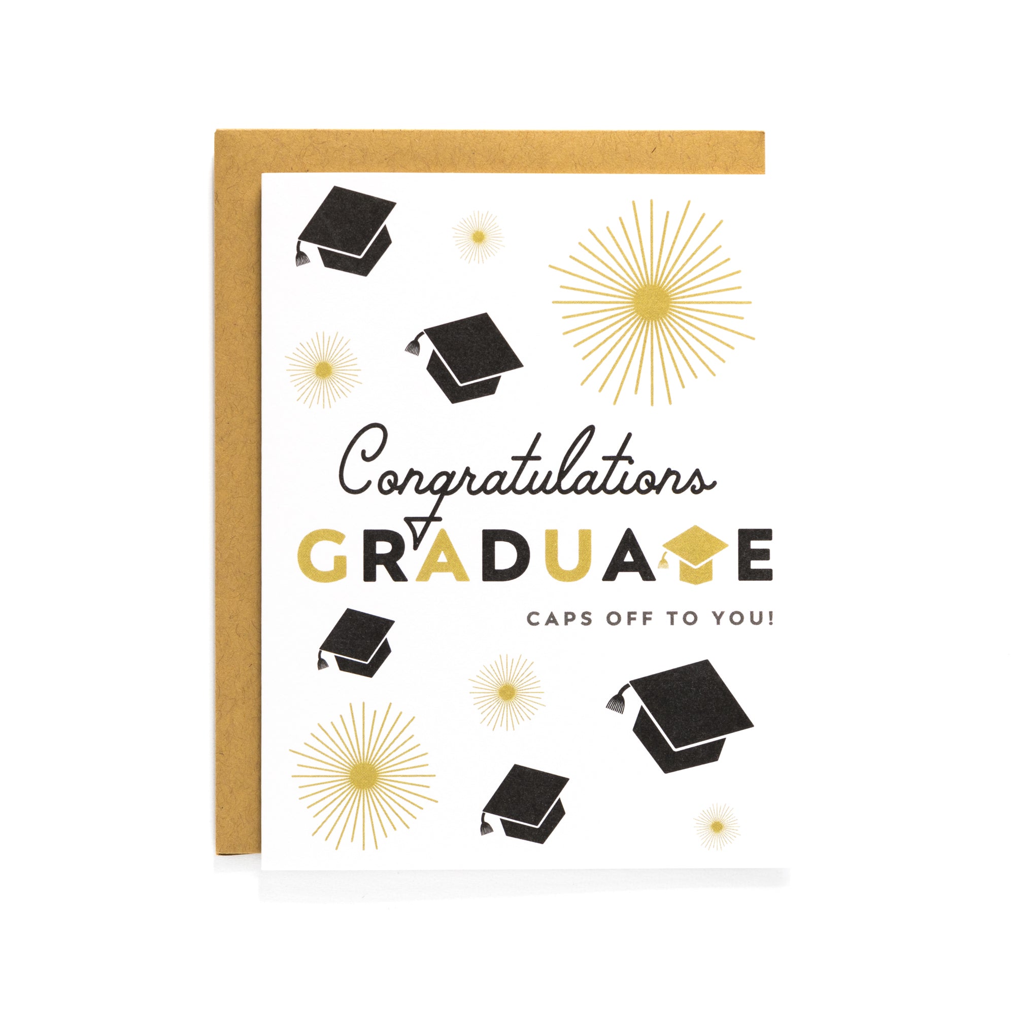 Graduation card with black caps and gold starbursts saying congratulations graduate caps off to you with kraft envelope