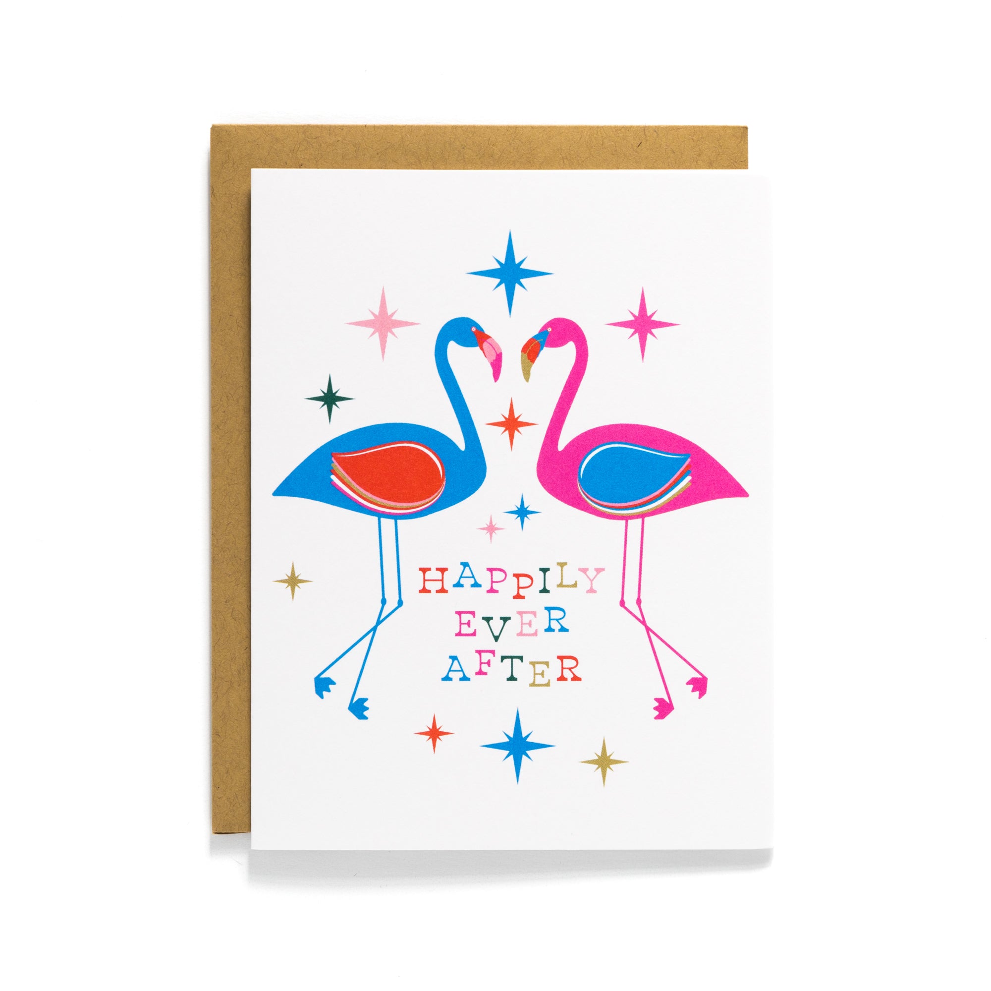 A colorful card with two flamingos facing each other and the text Happily Ever After surrounded by stars