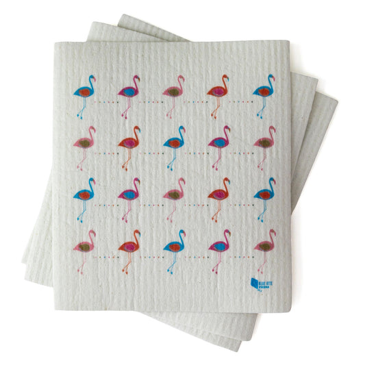 Eco-friendly Swedish dishcloth with colorful flamingo pattern in pink and blue on white background, showcasing sustainable and stylish kitchen cleaning solution