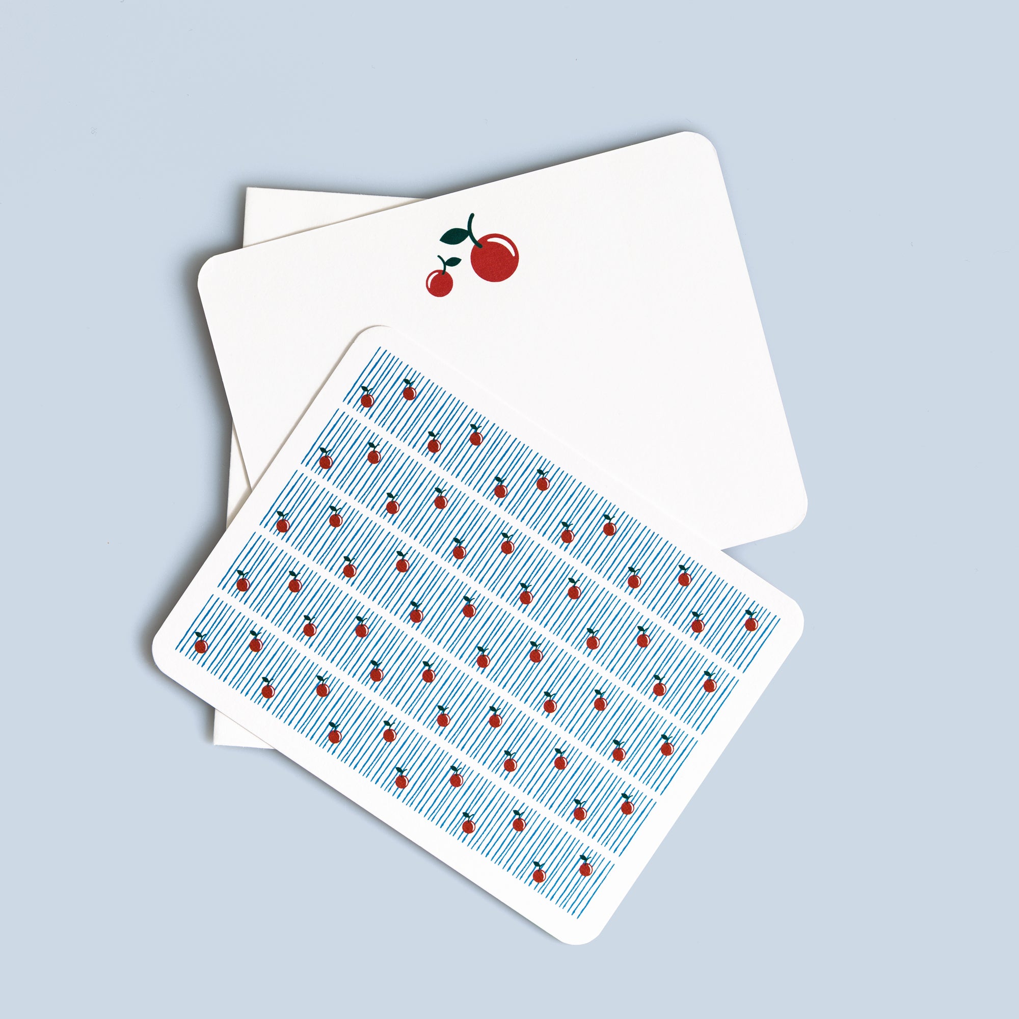 Set of six cherry flat cards with small cherry illustration on front and coordinating white envelopes, A2 size