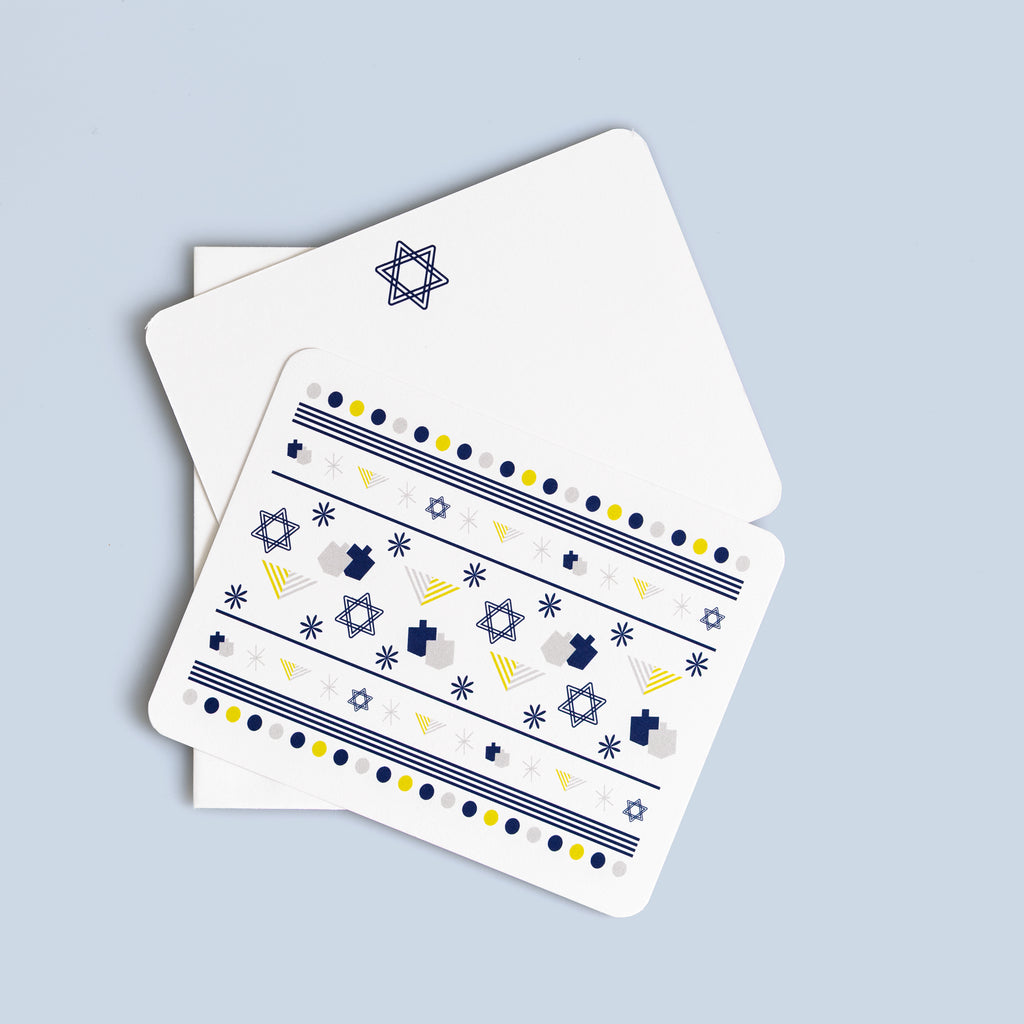 Hanukkah flat card set featuring menorahs, Stars of David, and dreidels with coordinating envelopes, six cards included