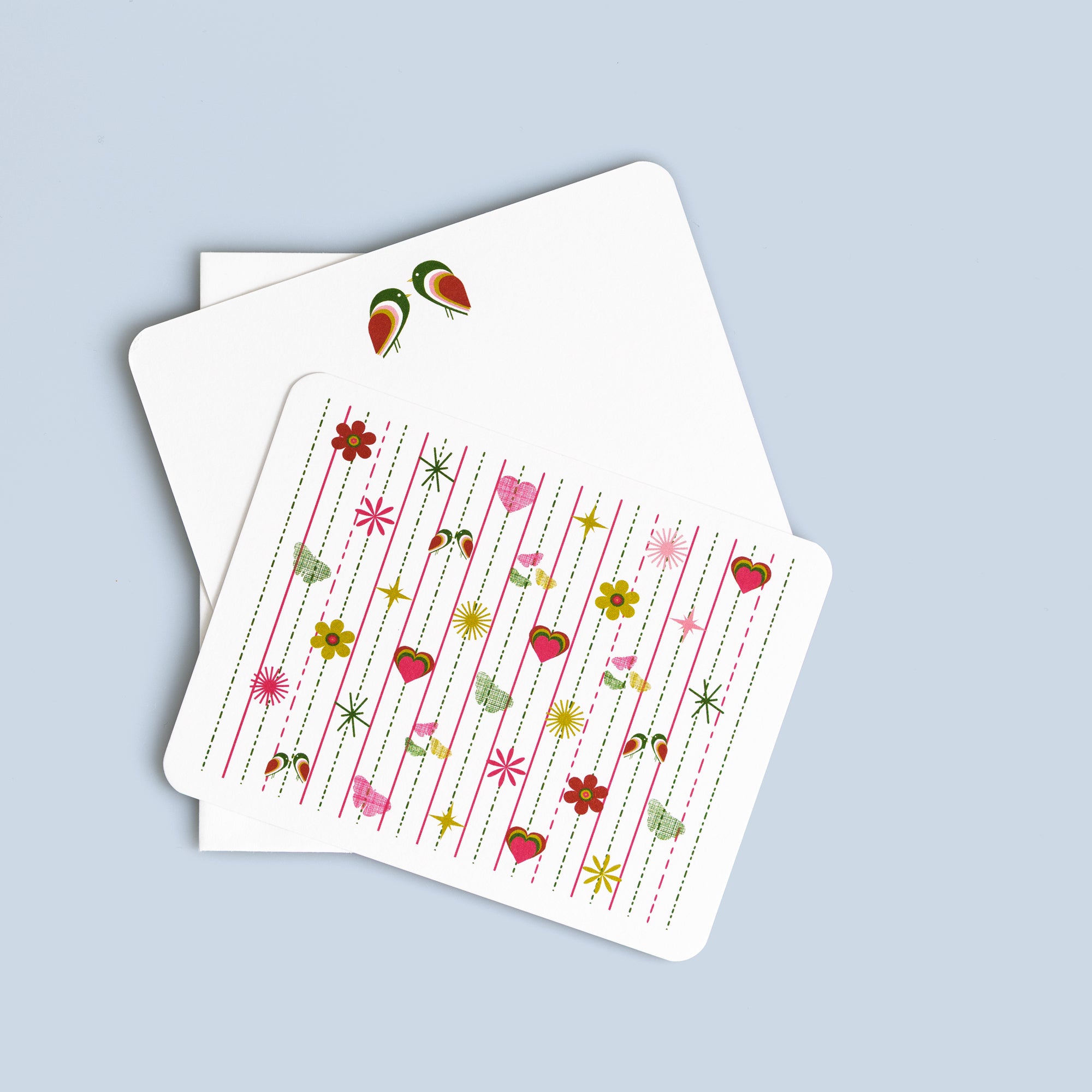 Pink Tiki flat card set with colorful mid-century modern floral and heart patterns, includes matching envelopes.