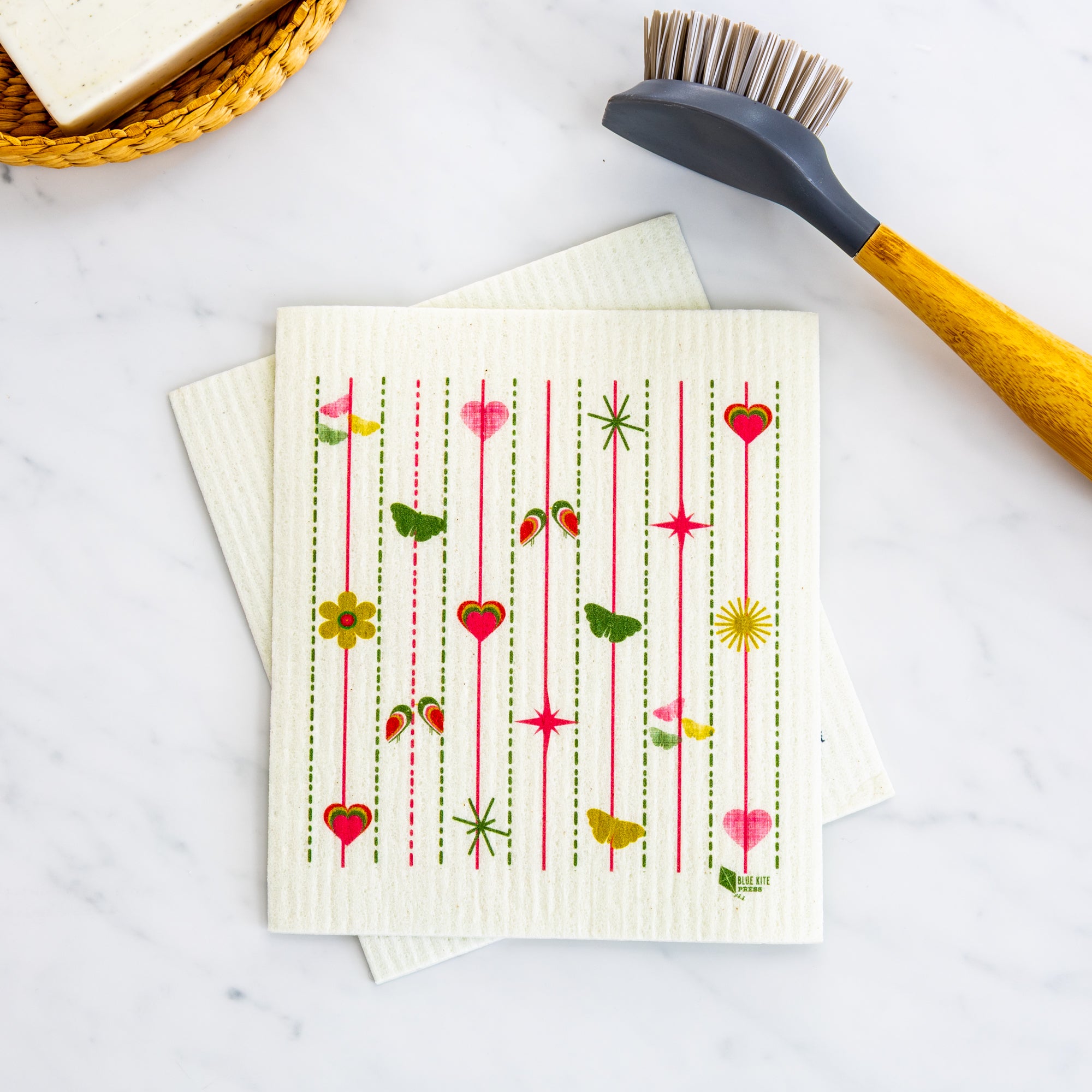 Pink Hearts & Flowers Swedish Dishcloth with retro floral heart and bird design, eco-friendly and reusable kitchen cleaning cloth.