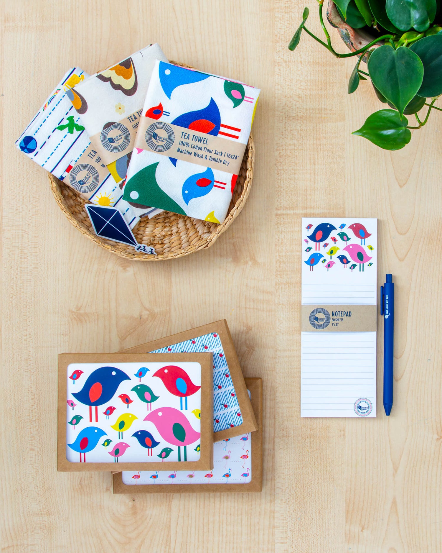 Tea towels, notecards and notepad with bright and joyful bird design