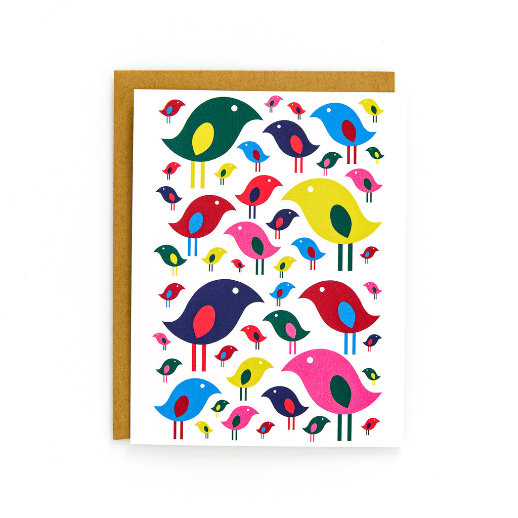 Colorful bird pattern on bright white card with kraft envelope, perfect for joyful celebrations and heartfelt messages.