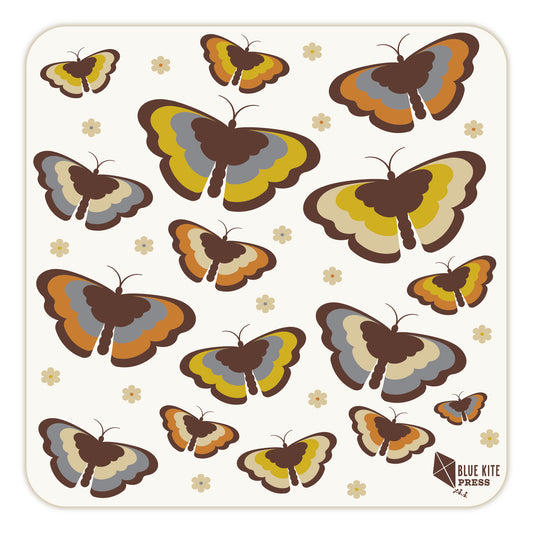 Retro-style paper coaster with a 70s-inspired butterfly pattern featuring multiple butterflies in earthy tones of brown, yellow, and orange on a light background with small flower accents