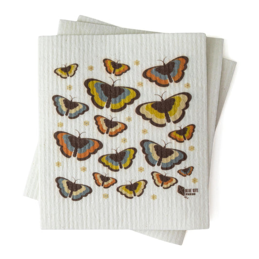 Eco-friendly Swedish dishcloth with colorful butterfly pattern in retro 70s style, featuring various sizes of butterflies in yellow, orange, and blue tones on a white textured background