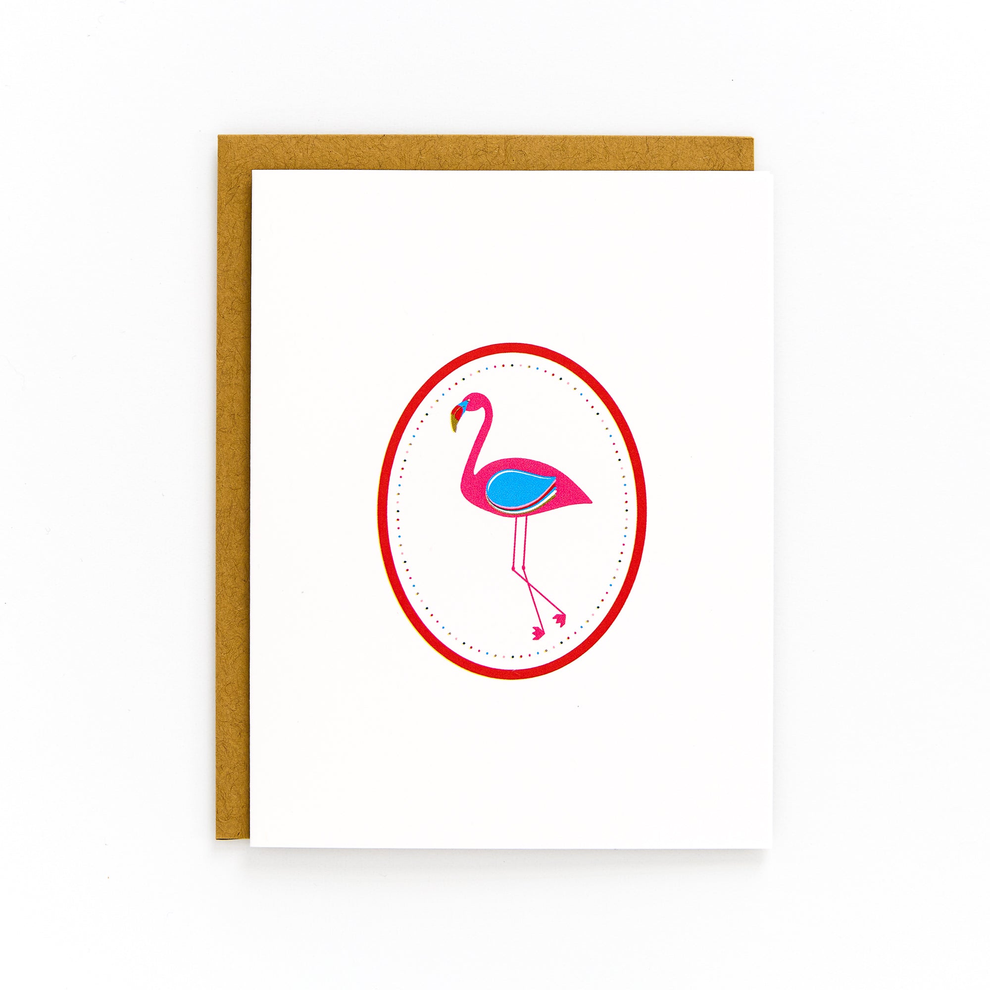 A retro-style Flamingo Card with a pink flamingo illustration on a white background, including a brown Kraft envelope.
