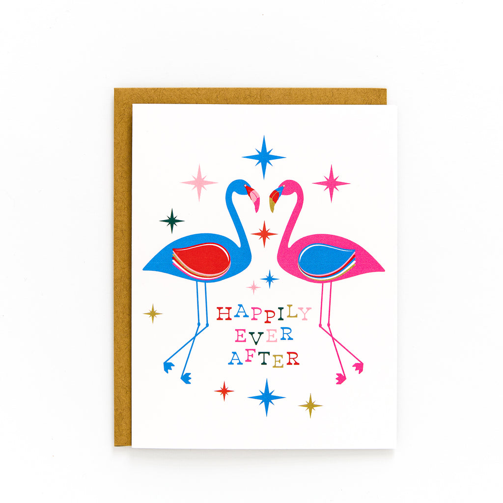 Colorful "Happily Ever After" card with pink and blue flamingos surrounded by bright stars, perfect for romantic celebrations.