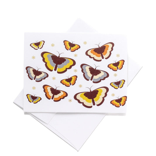 Retro-style notecard featuring colorful 70s-inspired butterfly illustrations in yellow, orange, and brown tones on white background, with matching envelope, embodying vintage aesthetic charm