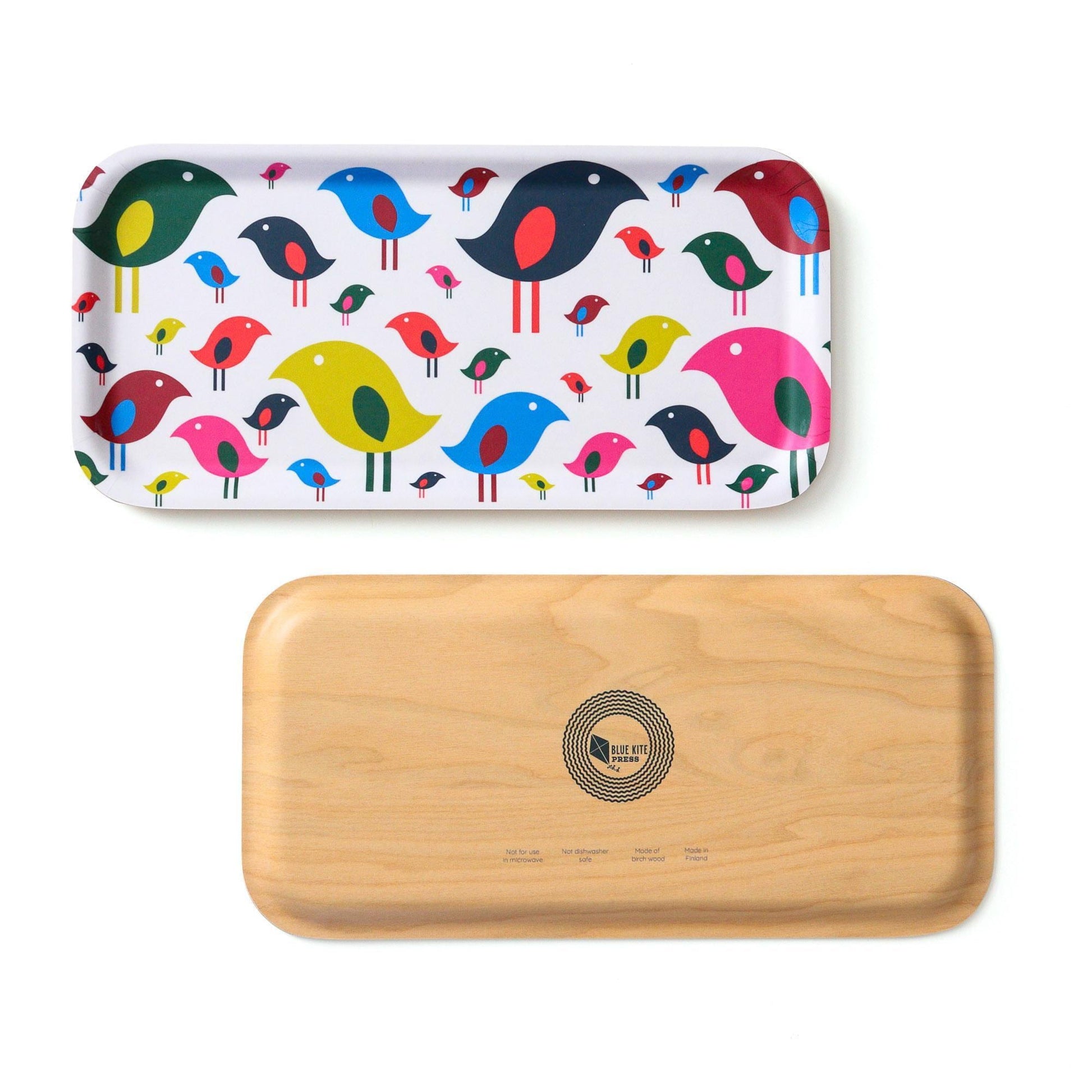 Colorful modern bird flock design on rectangular birch tray, featuring vibrant abstract birds in various sizes and colors on white background, alongside plain wooden underside with circular logo