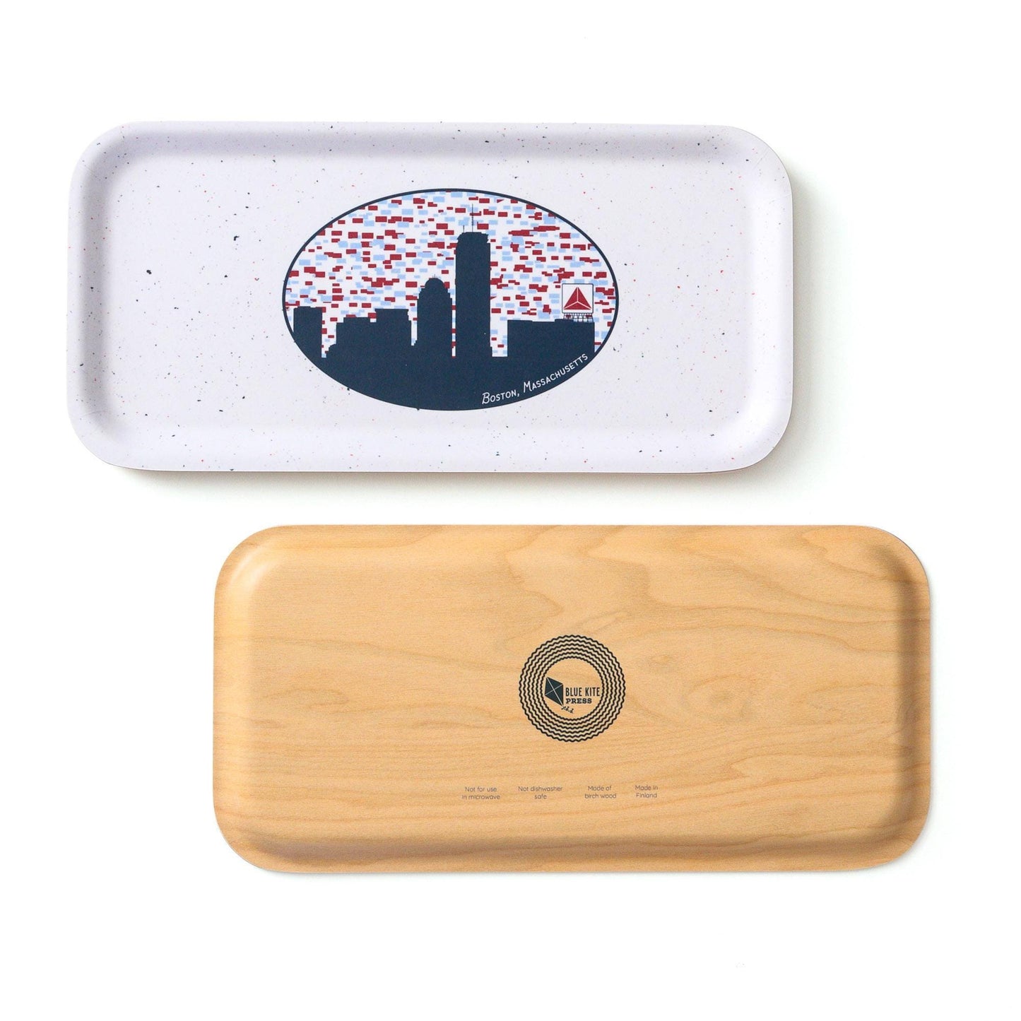 Boston skyline birch veneer tray with iconic Citgo sign. White tray features oval design of city silhouette against red-dotted sky. Wooden tray underneath displays brand logo. Eco-friendly serving trays showcase Boston&#39;s charm.