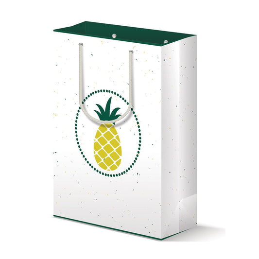 White gift bag with green trim featuring a stylized yellow pineapple design in a circular dotted frame. The bag has a speckled texture and rope handles, presenting a modern and cheerful look for gifting occasions.